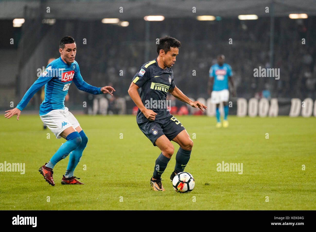 Napoli, Italy. 21st Oct, 2017. Naples - Italy 21/10/2017 JOSE MARIA CALLEJON of S.S.C. NAPOLI and of YUTO NAGATOMO Inter fights for the ball during Serie A match between S.S.C. NAPOLI and Inter at Stadio San Paolo of Naples. Credit: Emanuele Sessa/Pacific Press/Alamy Live News Stock Photo