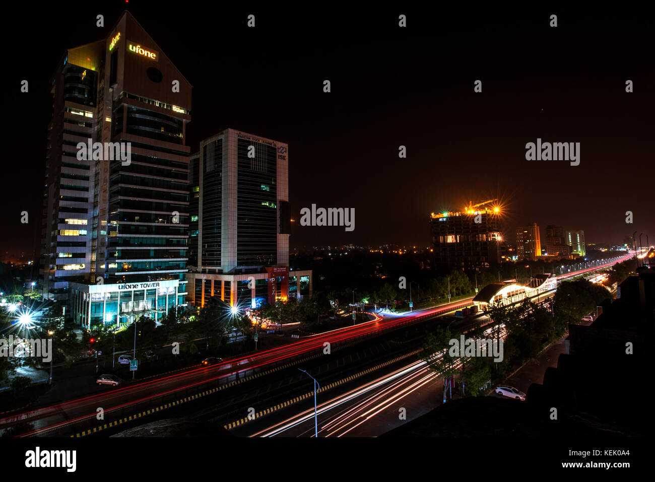 Night view of Islamabad stock Exchange, Ufone tower, metro bus station, Blue are Islamabad Stock Photo
