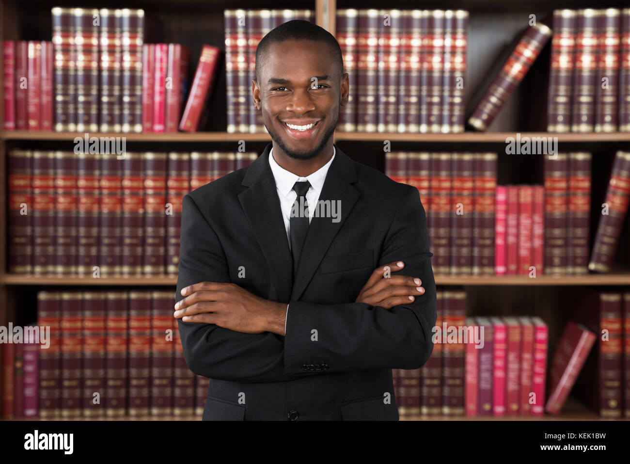Portrait Of Happy Male Lawyer In Office Stock Photo