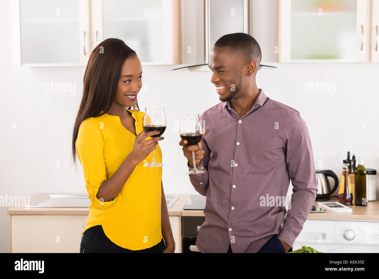 Young Happy African American Couple With Wineglasses Stock Photo - Alamy