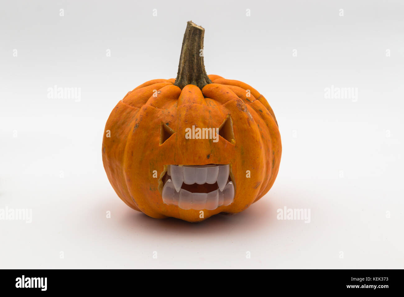 Halloween pumpkin with scary face. Jack O' Lantern isolated on white ...