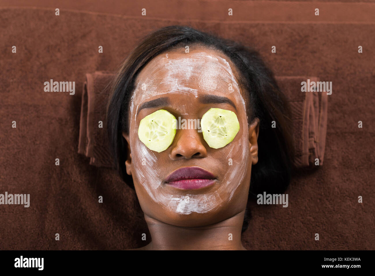 Close-up Of African Woman With Facial Mask In Spa Stock Photo