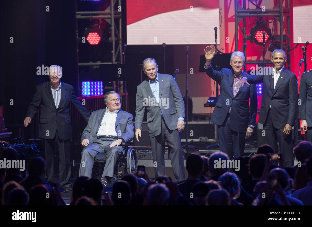 College Station, Texas USA Oct. 21, 2017: The five living former U.S. Presidents onstage at Texas A&M University's Reed Arena for a One America Appeal benefit concert and fund raiser for hurricane and storm relief. Left to right, former presidents Jimmy Carter, George H.W. Bush, George W. Bush, Bill Clinton and Barack Obama appear midway in the concert. Credit: Bob Daemmrich/Alamy Live News Stock Photo