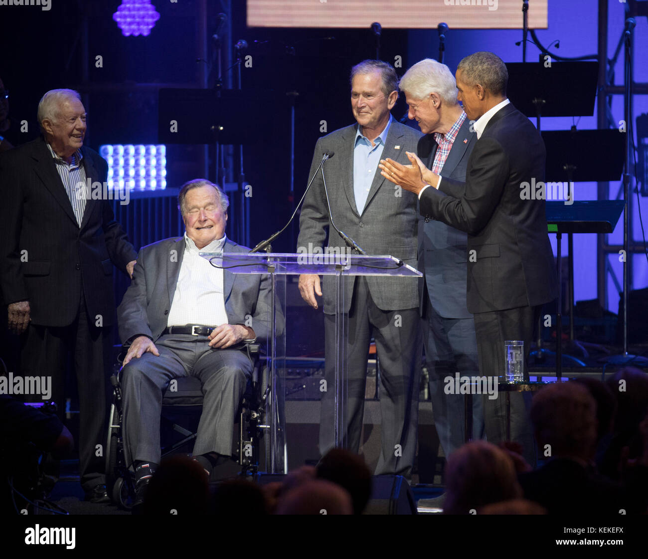 College Station, Texas USA Oct. 21, 2017: The five living former U.S. Presidents onstage at Texas A&M University's Reed Arena for a One America Appeal benefit concert and fund raiser for hurricane and storm relief. Left to right, former presidents Jimmy Carter, George H.W. Bush, George W. Bush, Bill Clinton and Barack Obama appear midway in the concert. Credit: Bob Daemmrich/Alamy Live News Stock Photo