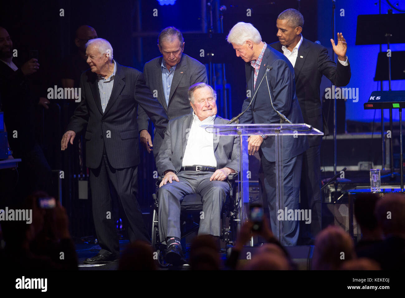 College Station, Texas USA Oct. 21, 2017: The five living former U.S. Presidents onstage at Texas A&M University's Reed Arena for a One America Appeal benefit concert and fund raiser for hurricane and storm relief. Left to right, former presidents Jimmy Carter, George W. Bush, George H.W. Bush, Bill Clinton and Barack Obama appear midway in the concert. Credit: Bob Daemmrich/Alamy Live News Stock Photo