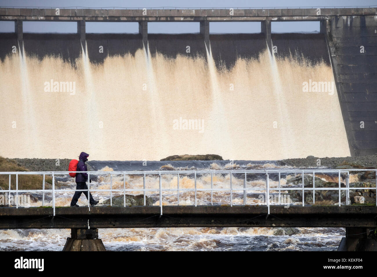 Cow Green Reservoir, Upper Teesdale, County Durham, UK.  Sunday 22nd October 2017.  UK Weather. Heavy rains cause Cow Green Reservoir to overflow as Storm Brian hits northern England.  Credit: David Forster/Alamy Live News Stock Photo