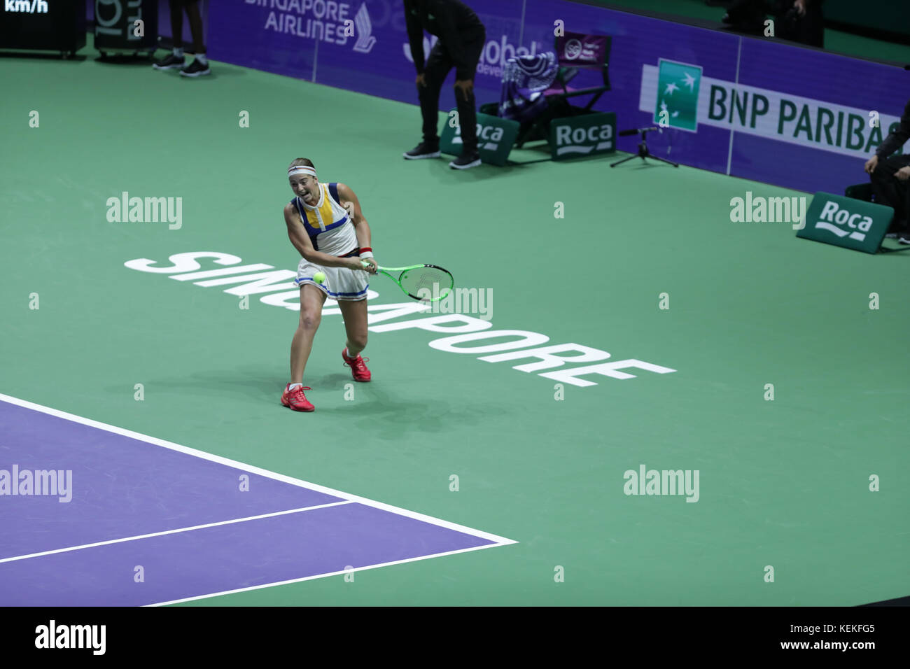 Jelena Ostapenko is in action during her first round robin match of the WTA Finals vs Latvian tennis player Spanish tennis player Garbine Muguruza on Oct 22, 2017 in Singapore, Singapore - ©Yan Lerval/Alamy Live News Stock Photo