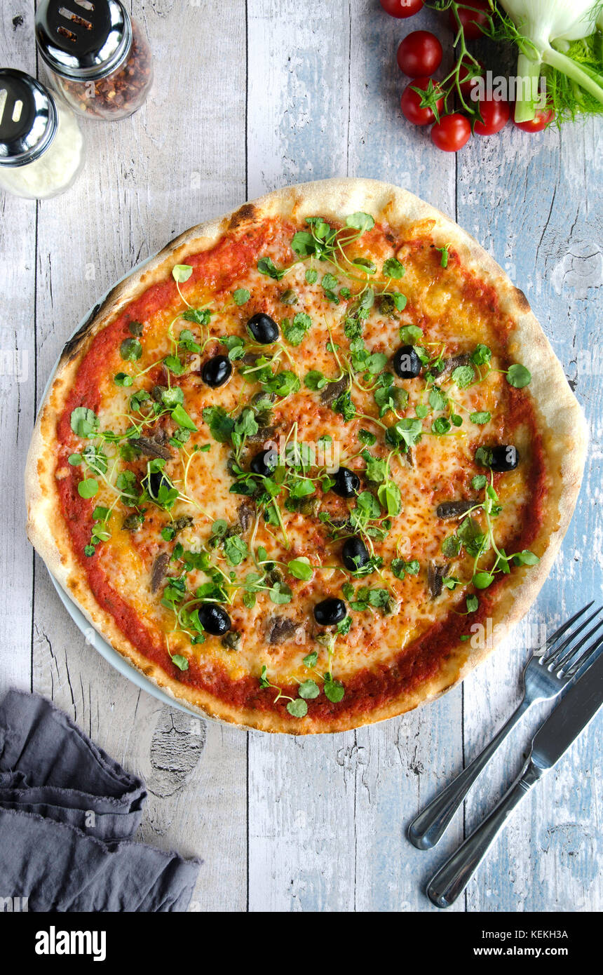 Pizza with anchovies and olives hires stock photography and images Alamy