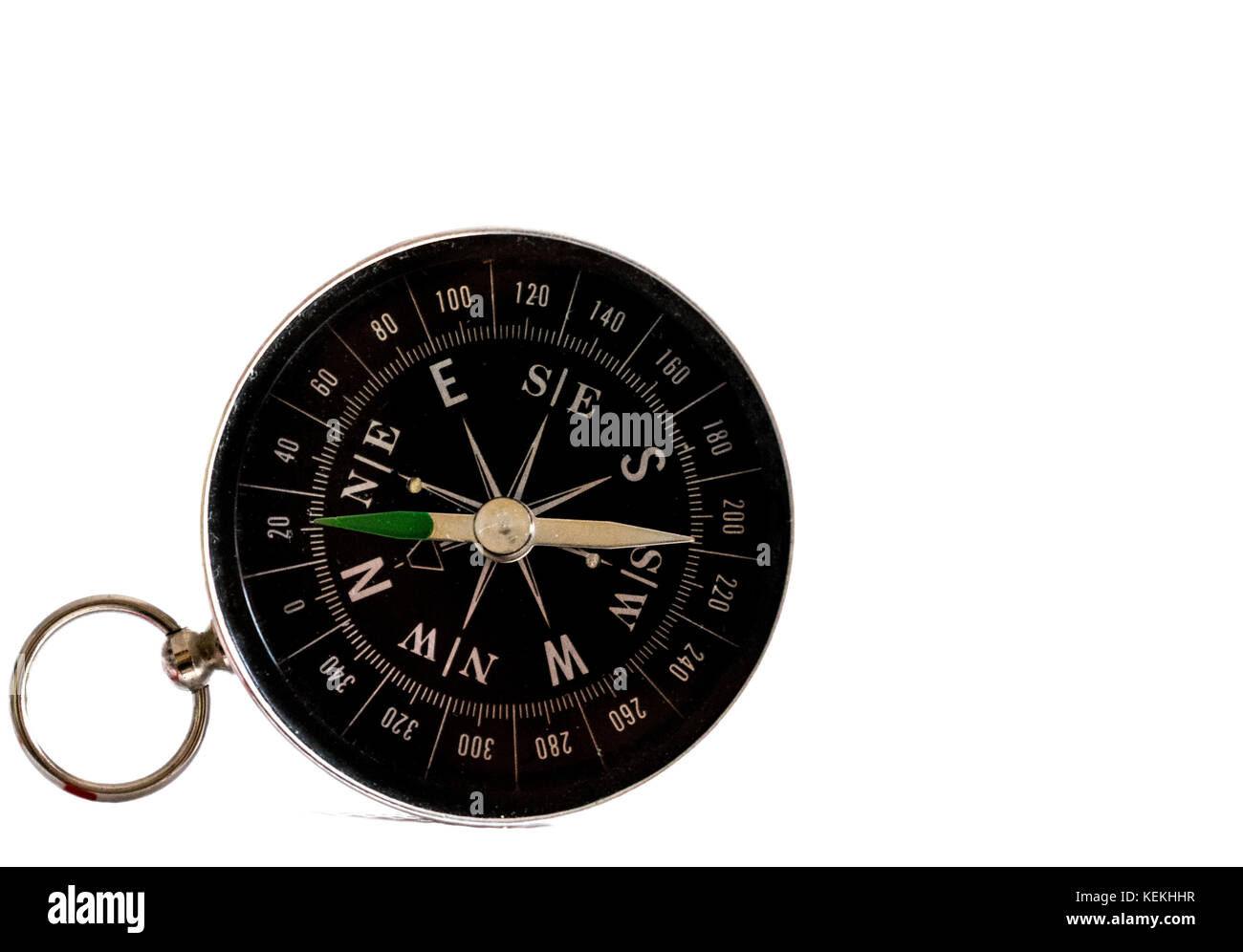 Isolated black navigation compass on a white background, hand pointing north Stock Photo