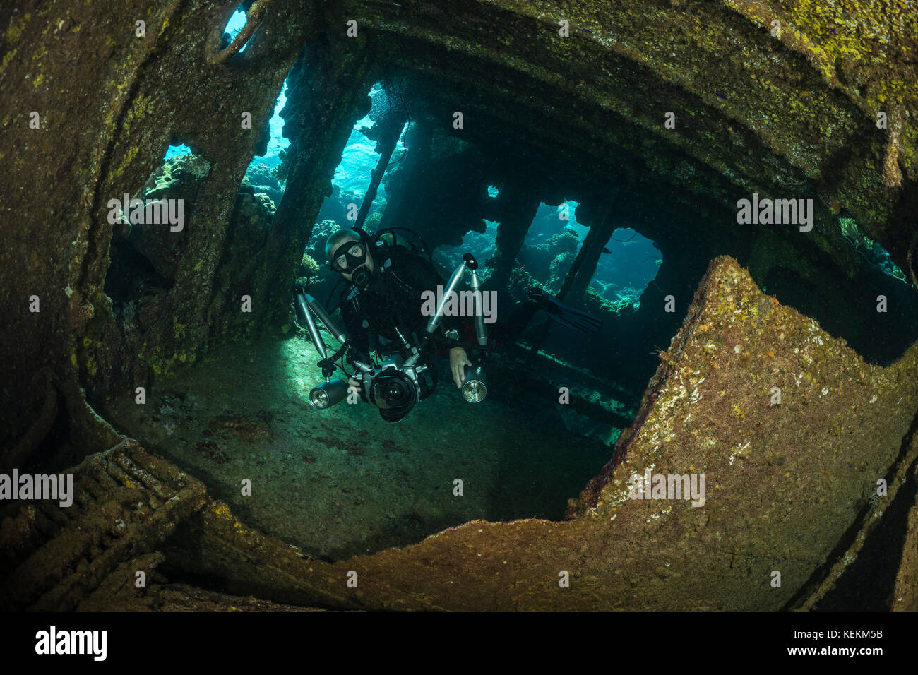 Scuba diver inside Bridge of Tien Sein Wreck, Fury Shoal, Red Sea, Egypt Stock Photo