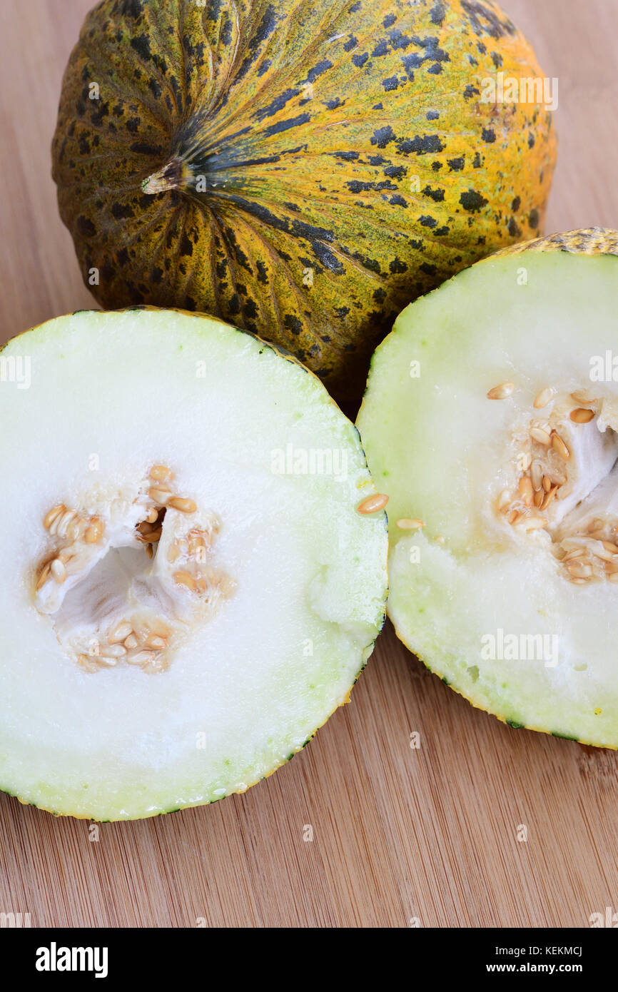 Melon on cutting board Stock Photo