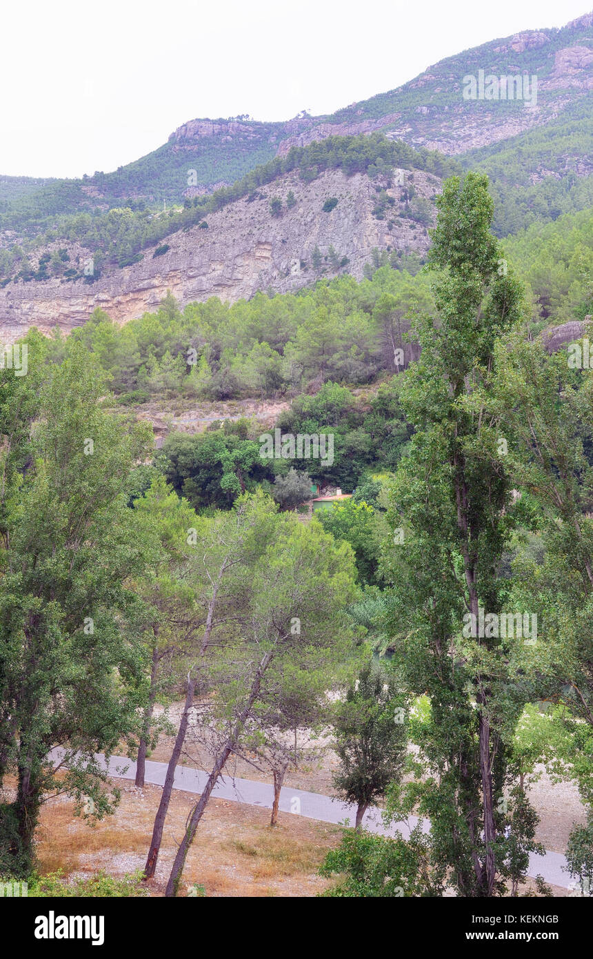 View of landscape since Rosaleda del Mijares hotel, in Montanejos village (province of Castellon - Spain). Mijares river at the bottom. Natural Stock Photo