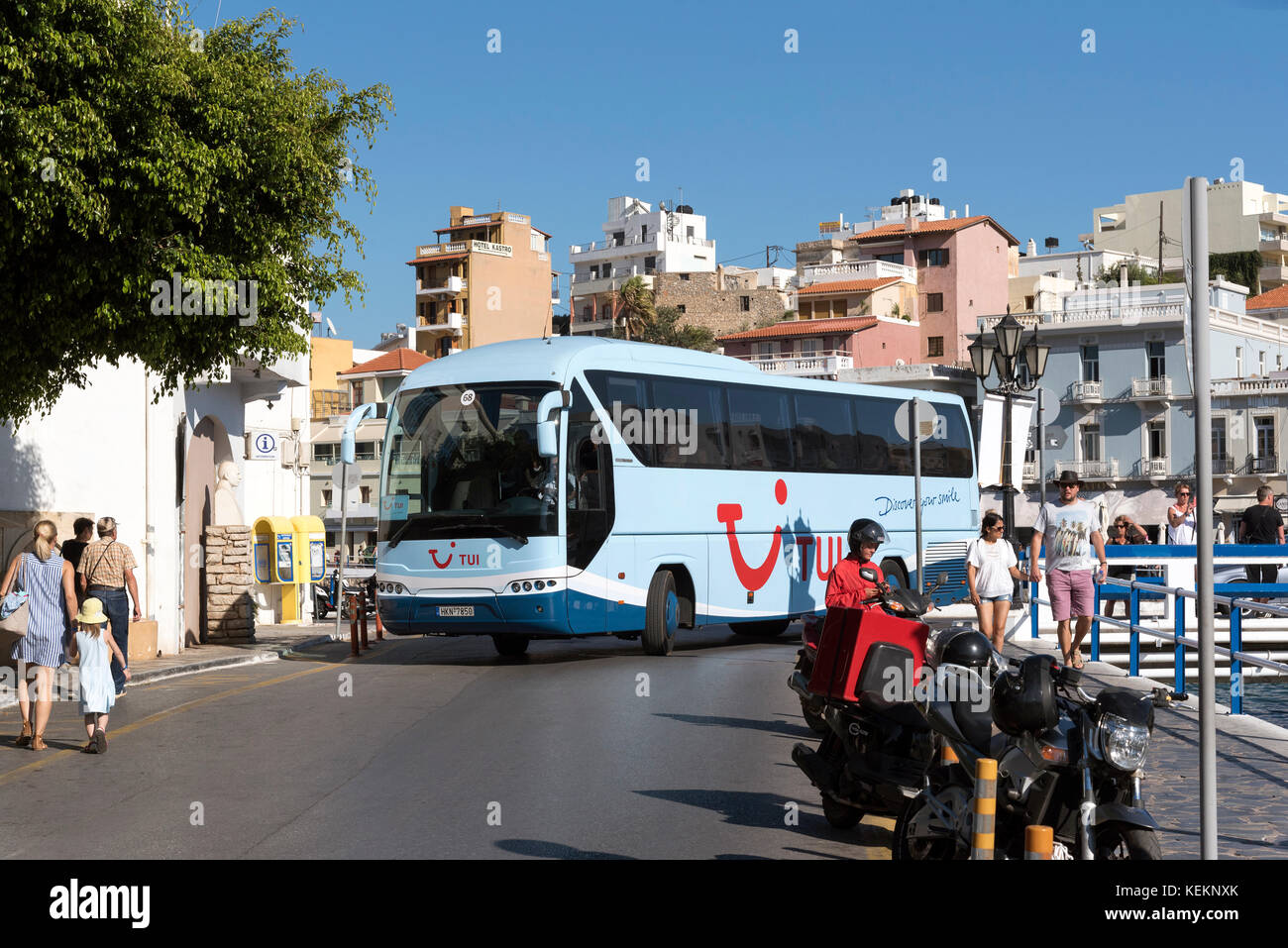 Agios Nikolaos Crete, Greece. A TUI coach passing through the old town ...