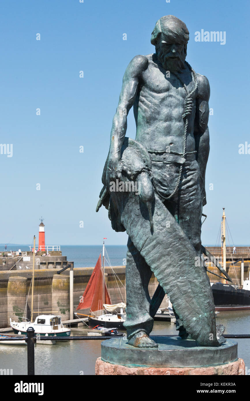 Statue of The Ancient Mariner on the waterfront at Watchet Harbour, Somerset England in comemoration of the rhymes author Samuel Coleridge Stock Photo
