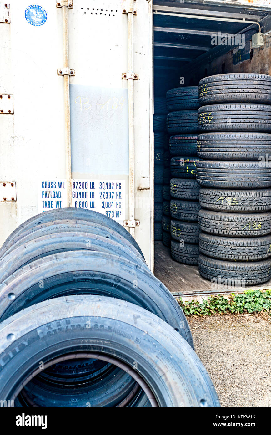 Pile of old Tyres in a shop Stock Photo