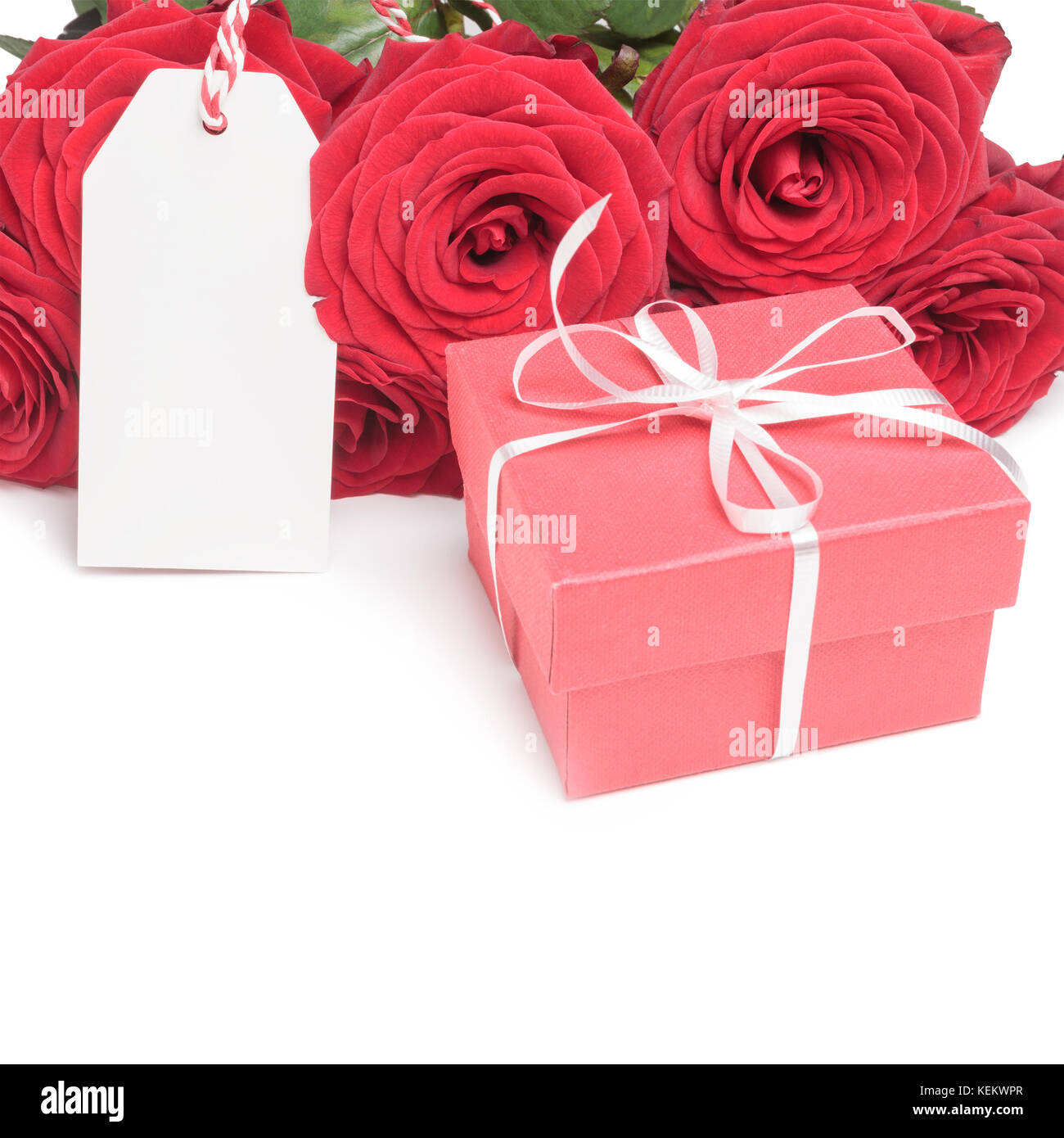 Card, box and roses on white  Stock Photo