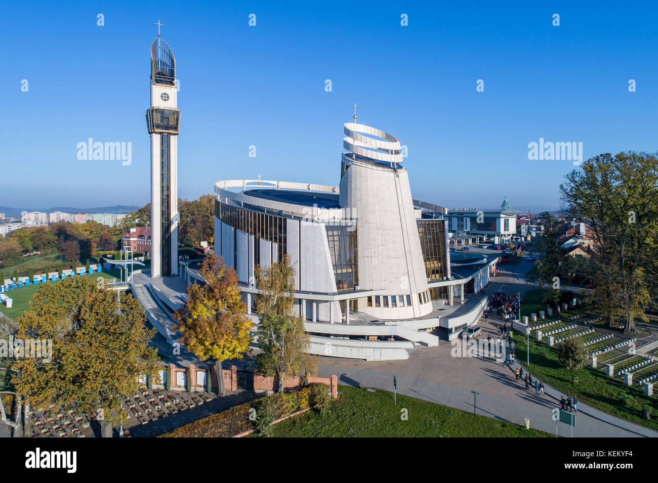 Sanctuary of  Divine Mercy, church, park and cemetery  in Lagiewniki, Cracow, Poland. Aerial view in early morning in fall Stock Photo