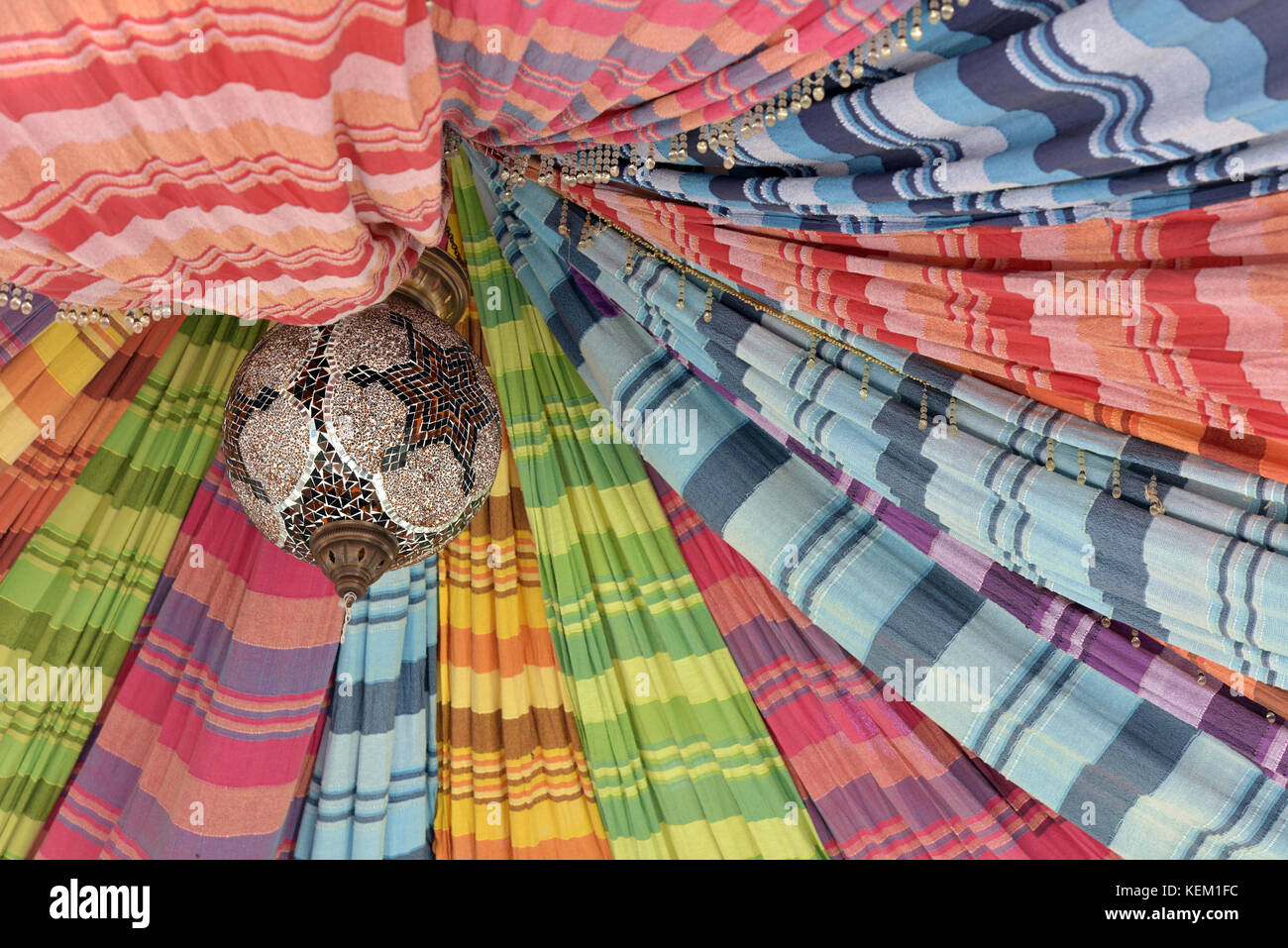 a multi-coloured colourful canopy or tented vaulted ceiling or shade ...