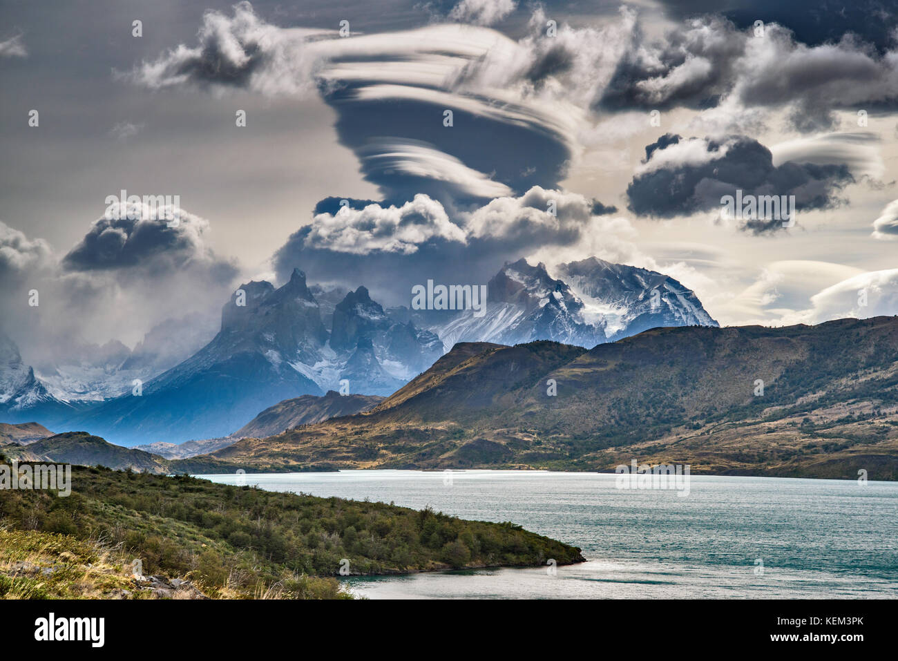 Torres del Paine, lenticular cloud, distant view over Lago Toro, Patagonia, Chile Stock Photo