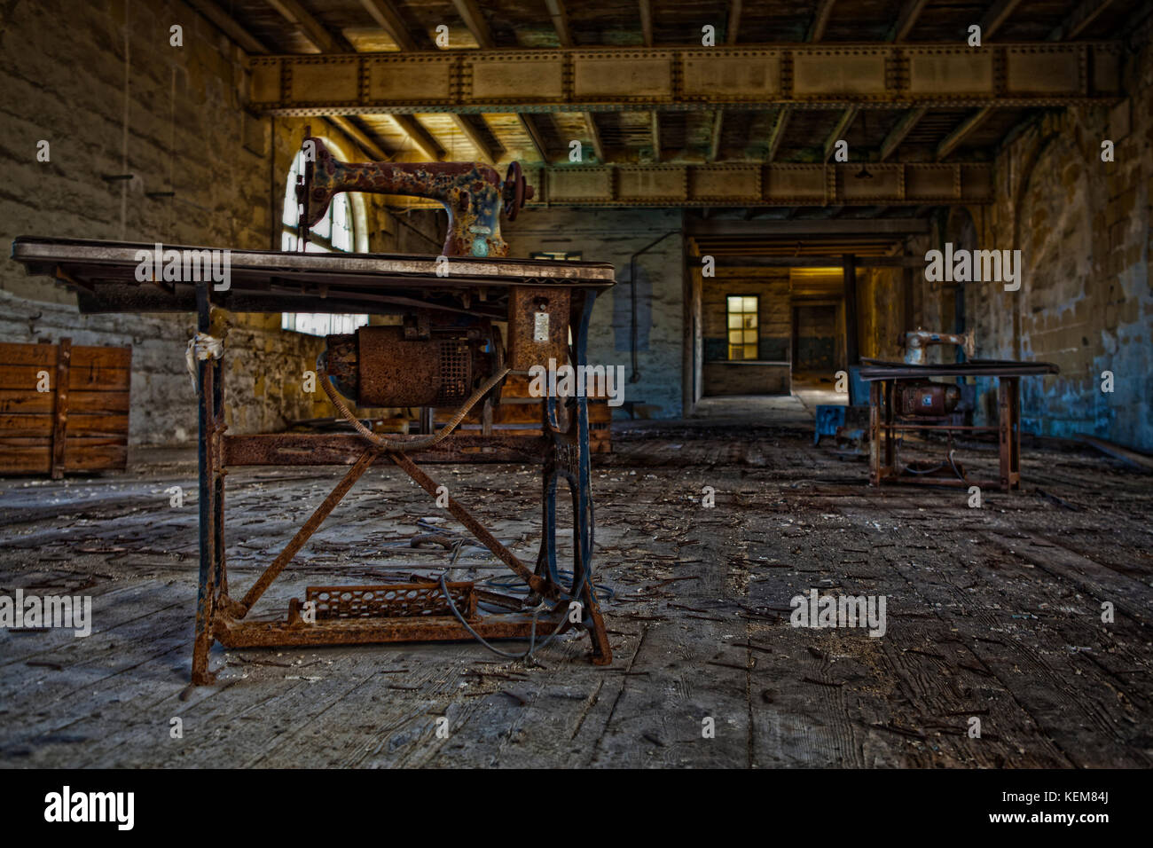 Two old sewing machine stations at Dock 1 in Senglea which was used as a sail sewing factory with cheap labour Chinese workers Stock Photo
