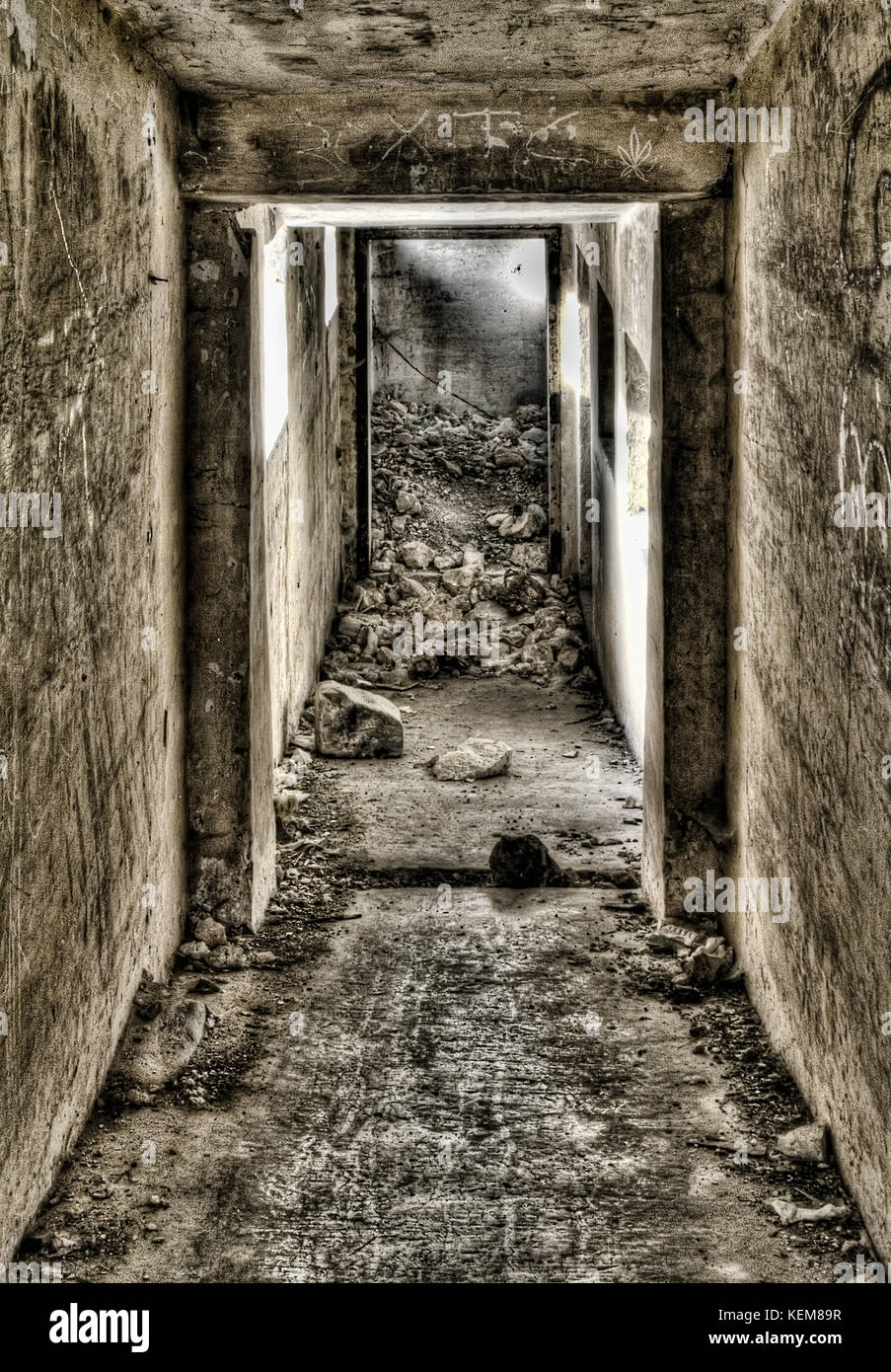 Entrance down to a derelict bunker shot in HDR Stock Photo
