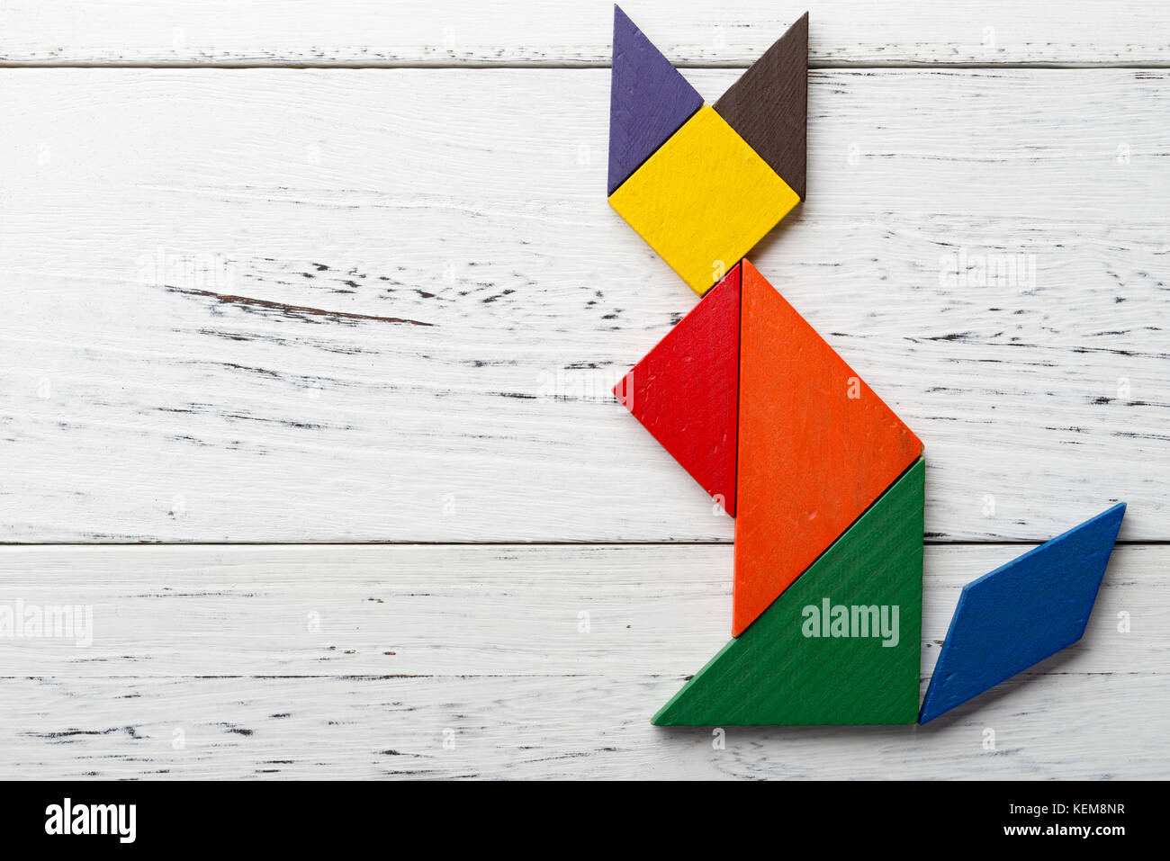 wooden tangram in a fox shape with copy space Stock Photo - Alamy