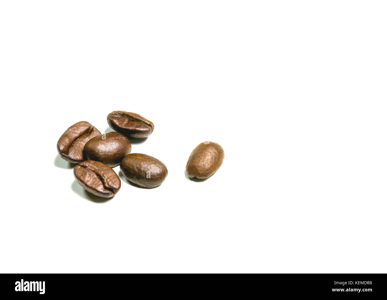 Roasted coffee beans isolated on white background Stock Photo - Alamy
