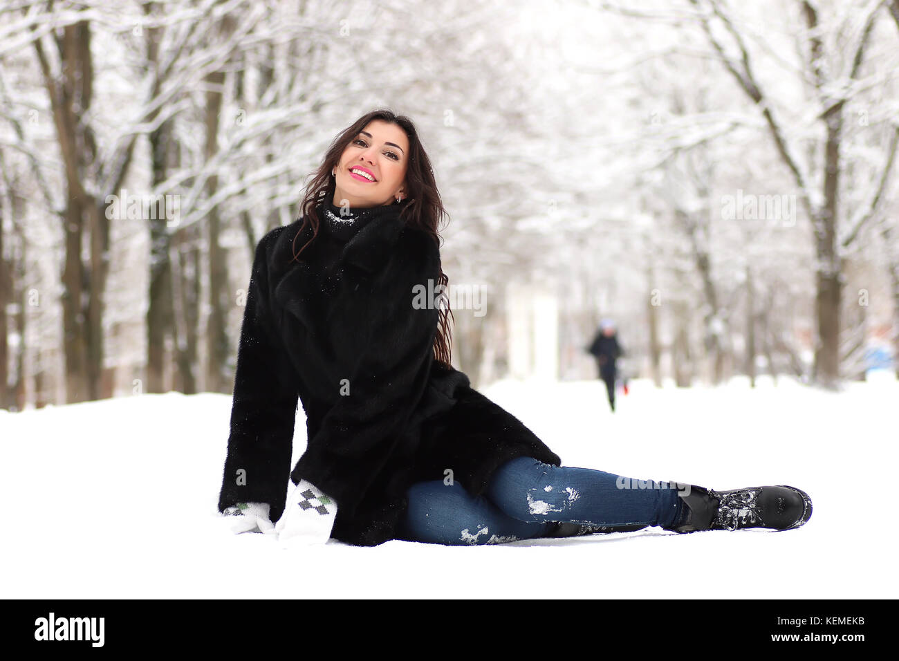 A young woman walk in a winter park Stock Photo - Alamy