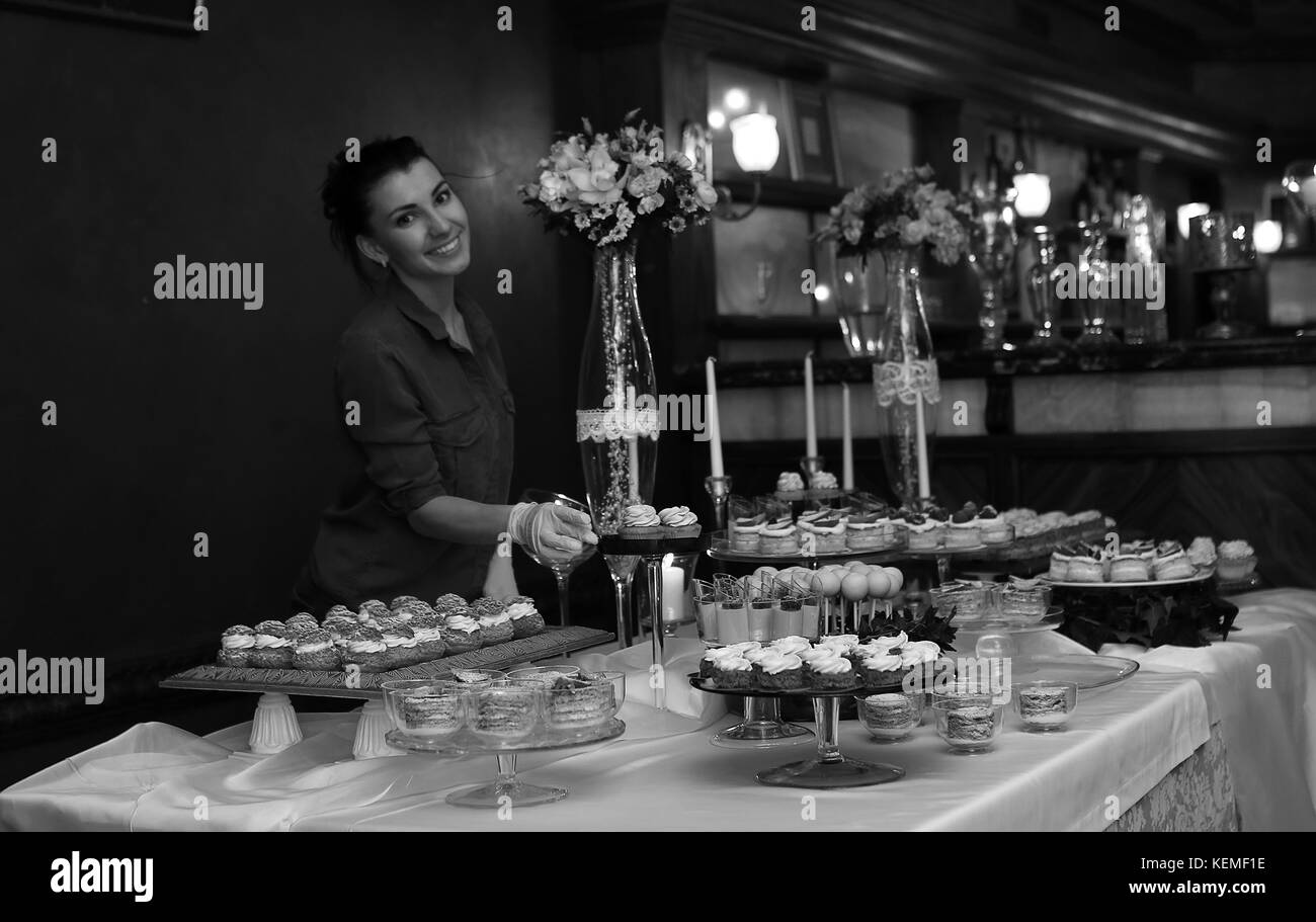 table with sweets and a variety of sweet snacks against the back Stock ...