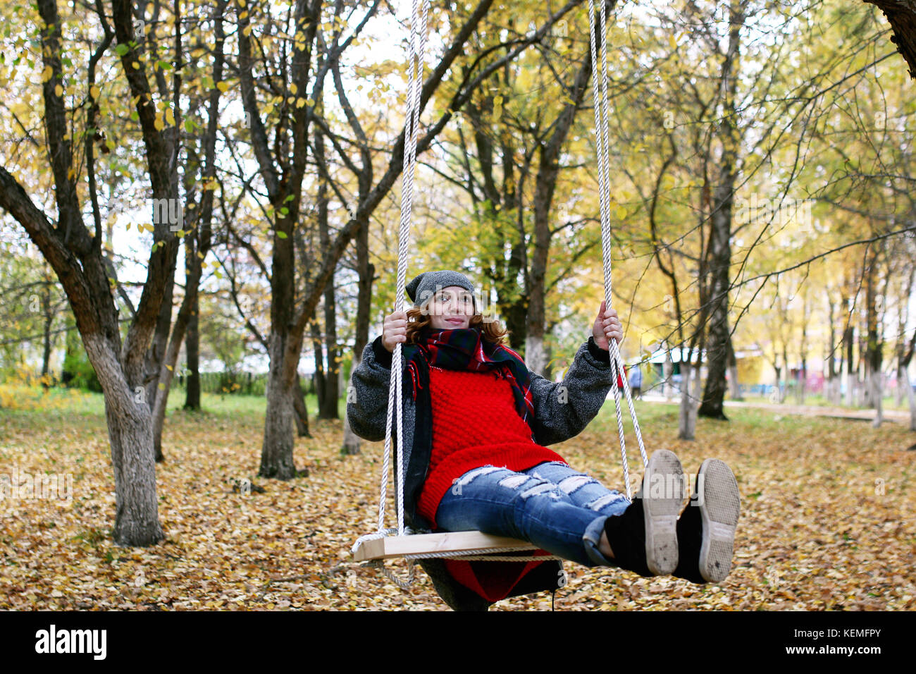 Girl on a walk in an autumn park Stock Photo - Alamy