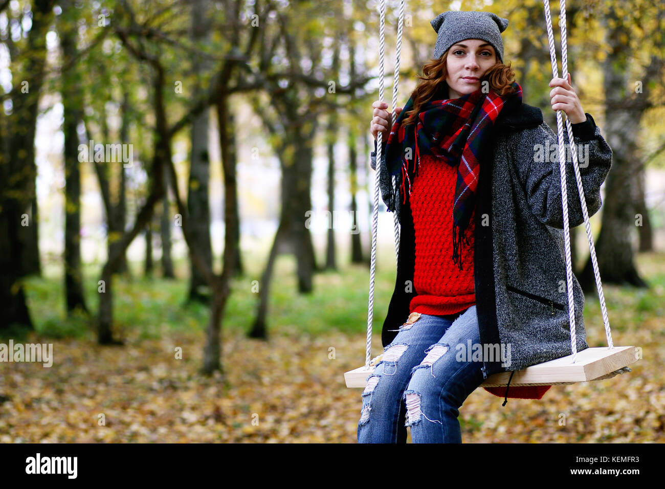 Girl on a walk in an autumn park Stock Photo - Alamy