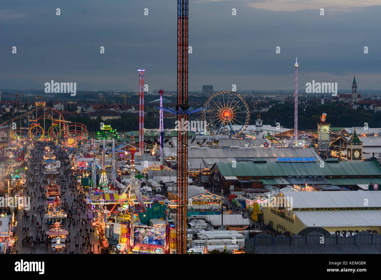 Oktoberfest beer festival: view, beer tent, rides, roller coaster ...