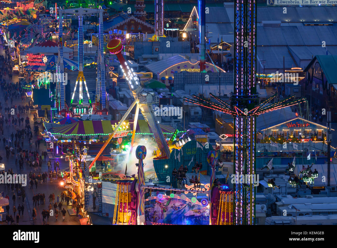 Oktoberfest beer festival view, beer tent, rides, roller coaster