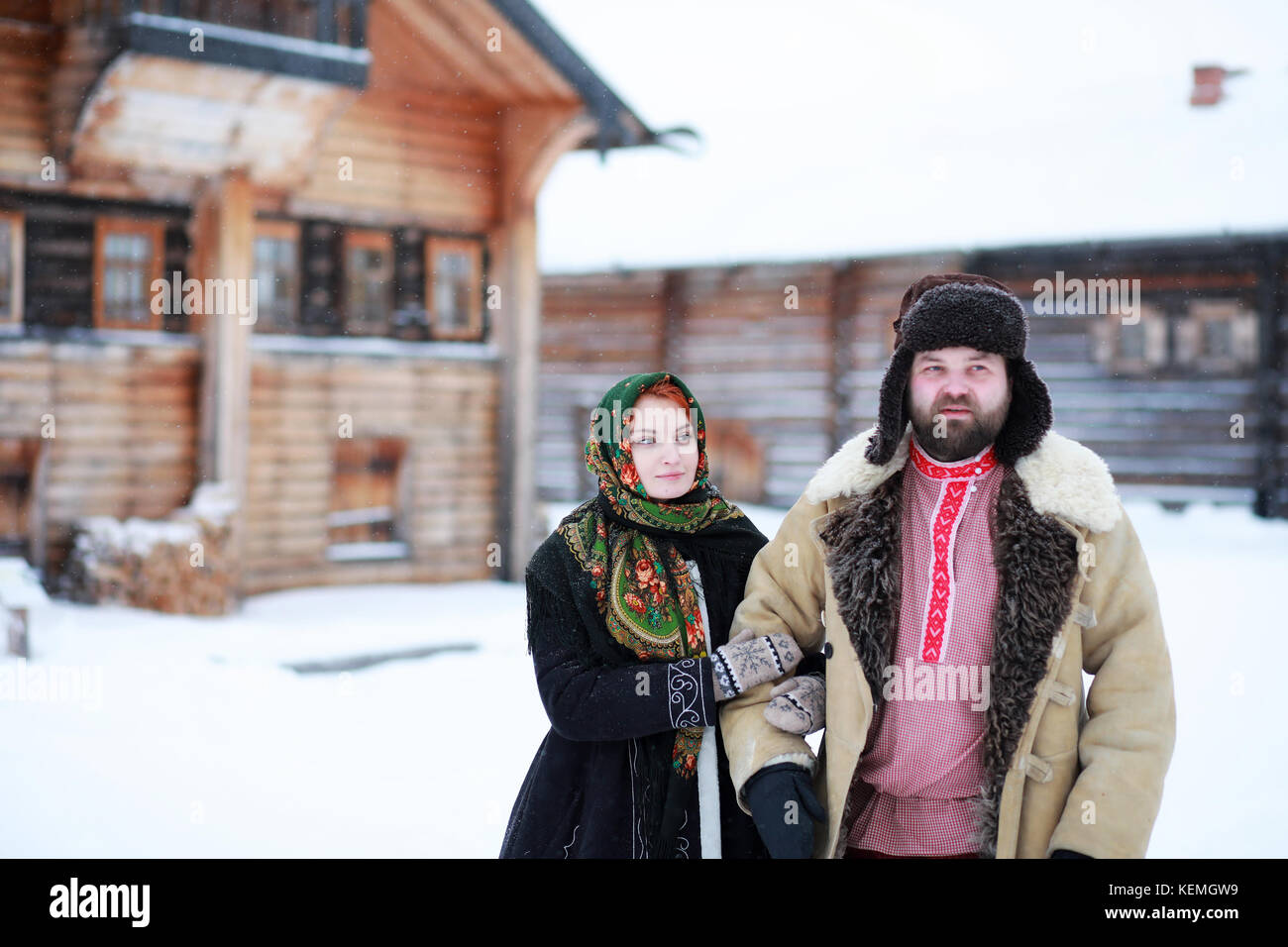 Couple in traditional winter costume of peasant in russia Stock Photo