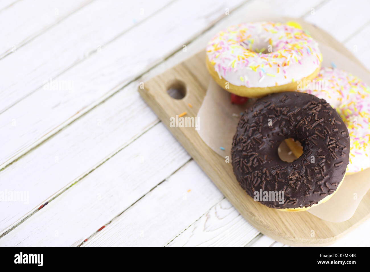 Chocolate Donut on a wooden white background Stock Photo - Alamy