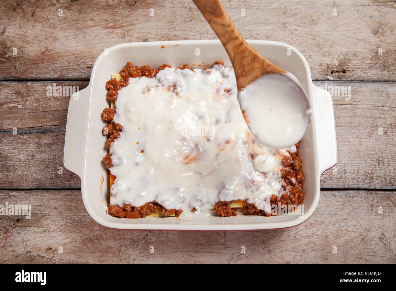 Making Lasagna Bolognese with beef, tomato at kitchen Stock Photo