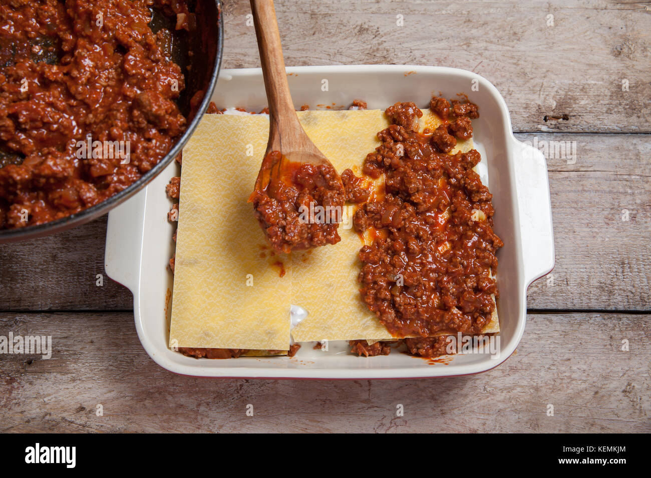 Making Lasagna Bolognese with beef, tomato at kitchen Stock Photo