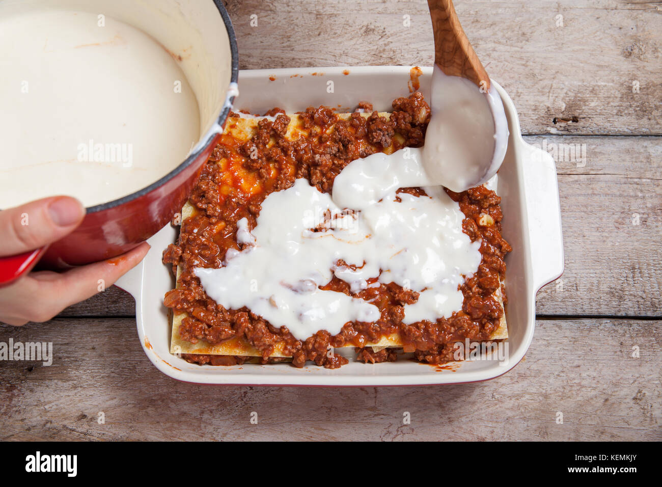 Making Lasagna Bolognese with beef, tomato at kitchen Stock Photo