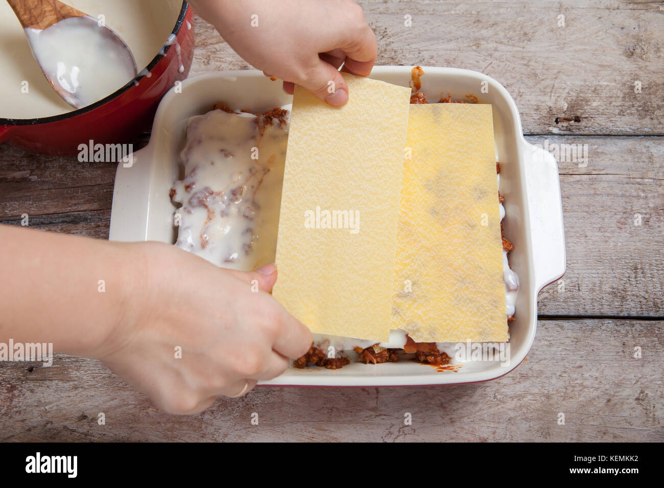 Making Lasagna Bolognese with beef, tomato at kitchen Stock Photo