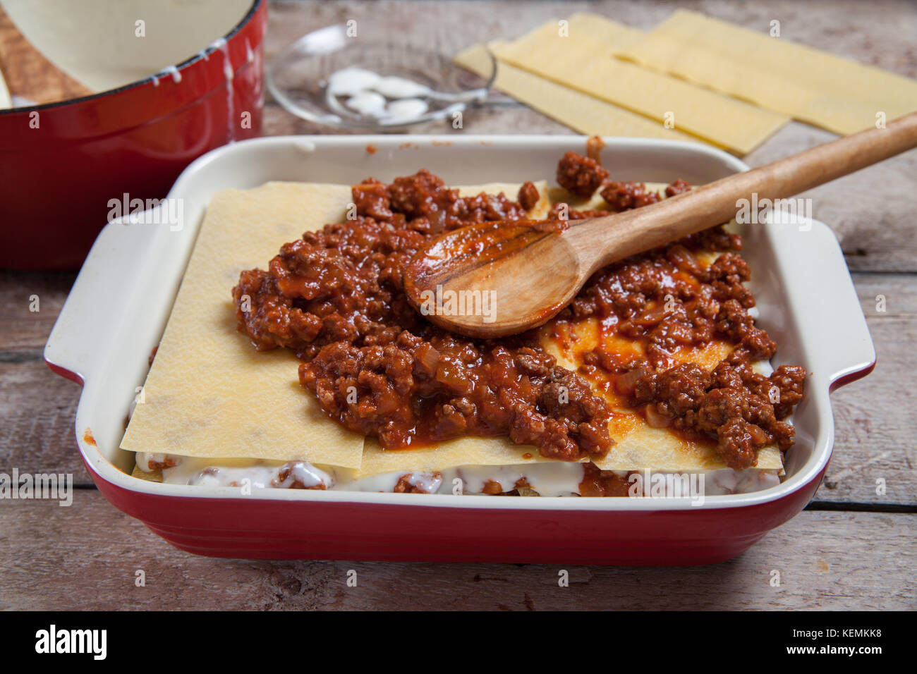 Making Lasagna Bolognese with beef, tomato at kitchen Stock Photo