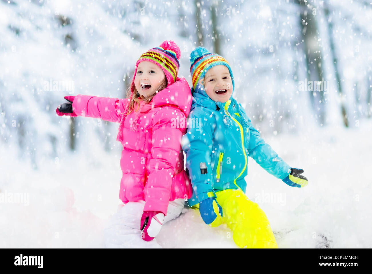 Kids playing in snow hi-res stock photography and images - Alamy