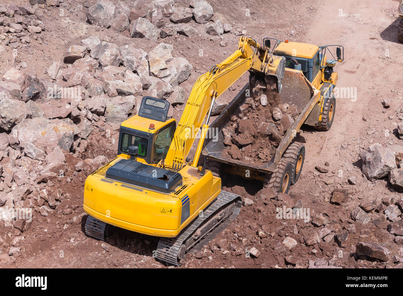 Industrial excavator machine loading construction truck vehicle heavy ...