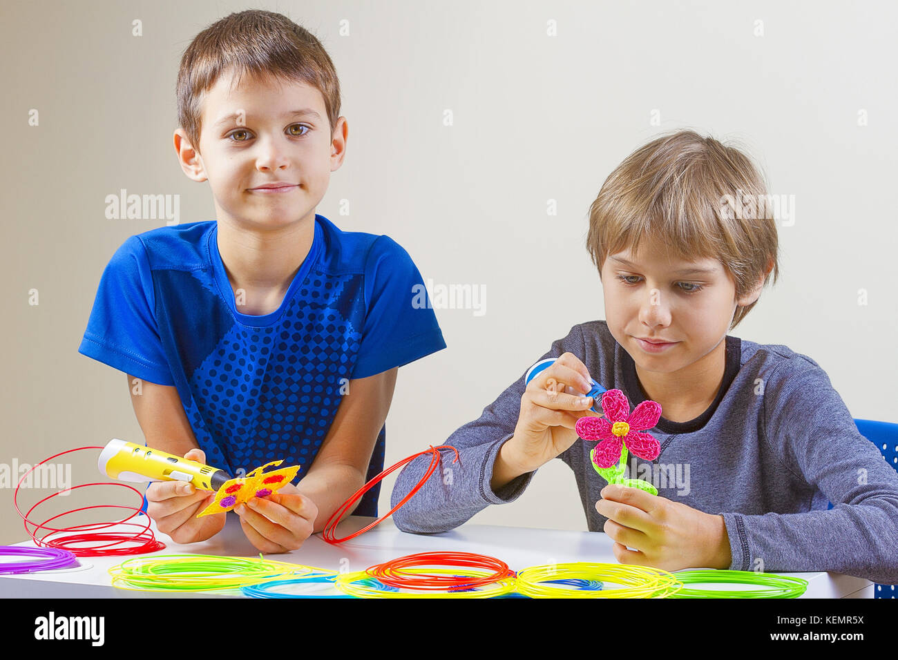 Children creating with 3d printing pen Stock Photo - Alamy