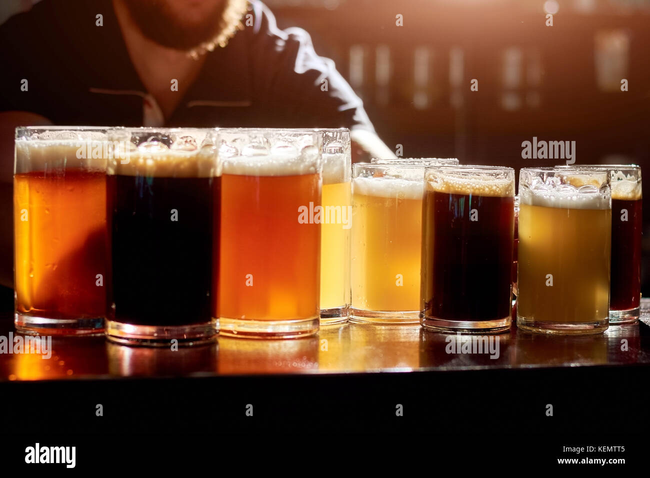 Assorted beers for tasting. Different sorts of draft beers. Set of