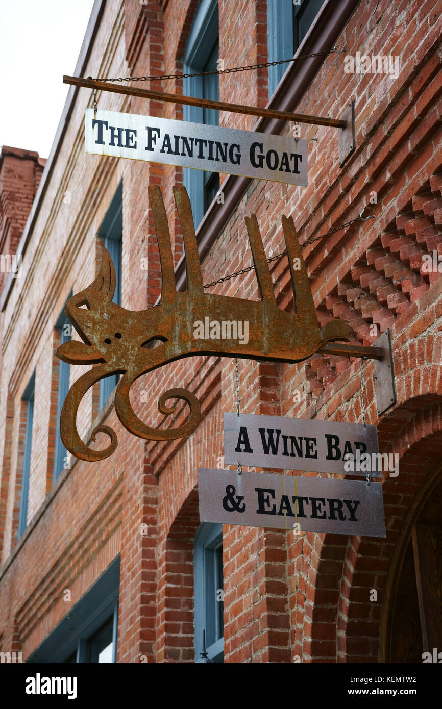 The Fainting Goat restaurant sign, downtown Wallace, Idaho, USA Stock Photo