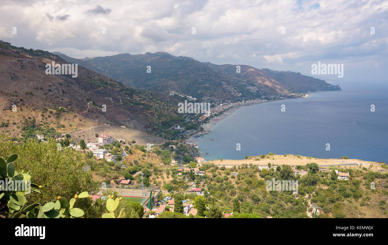 Panoramic view of Sicilian coast with Letojanni town from Taormina, Italy Stock Photo