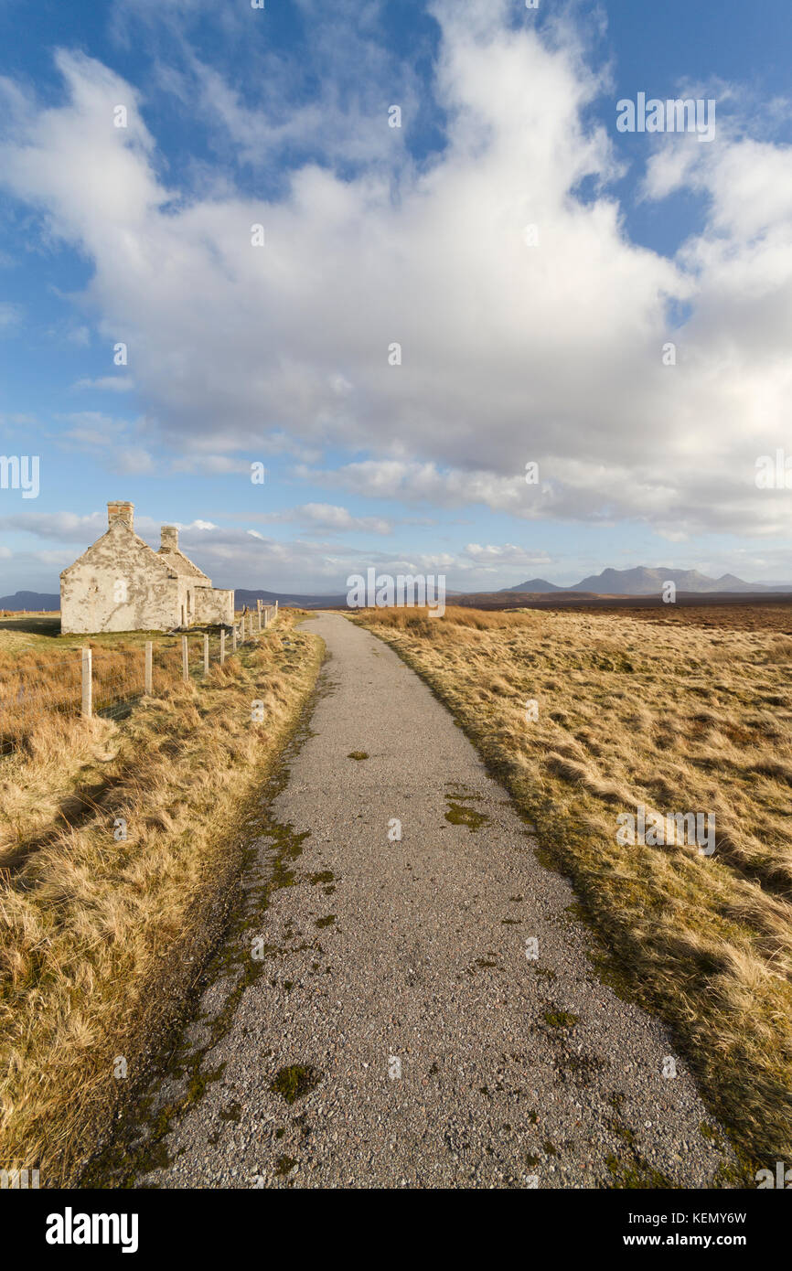 Old road A838 with abandoned cottage, Sutherland Stock Photo