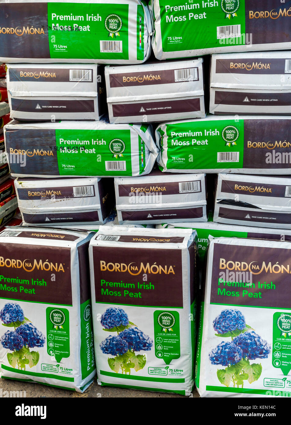 A stack of bags of Bord na Mona Premium Irish Moss Peat in a garden centre Stock Photo