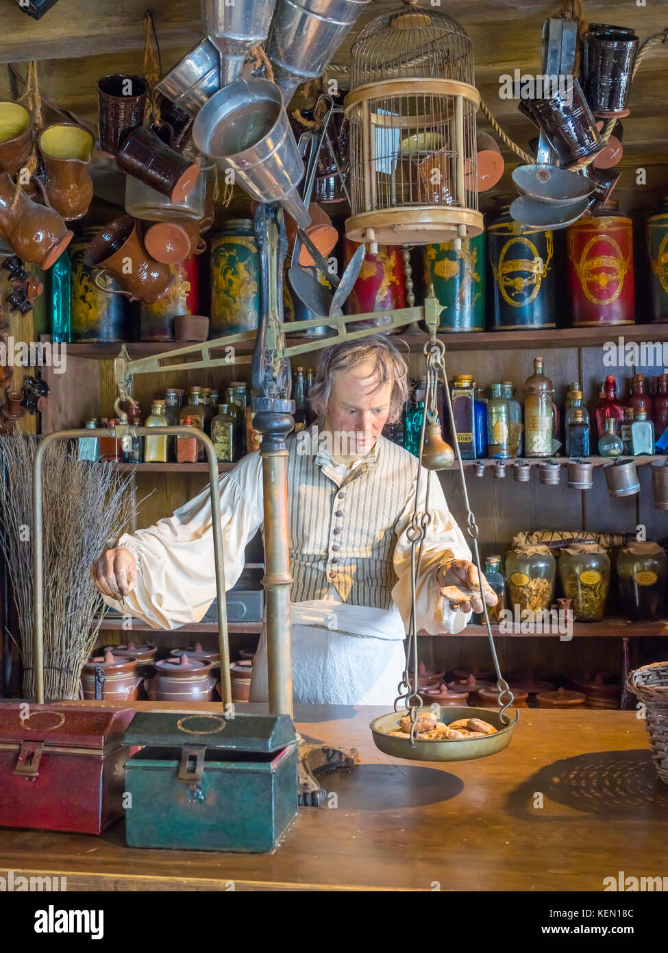 National Museum Royal Navy display depicting a 19C Ships Chandler in his shop filled with all kinds of food supplies tools and equipment for a ship Stock Photo