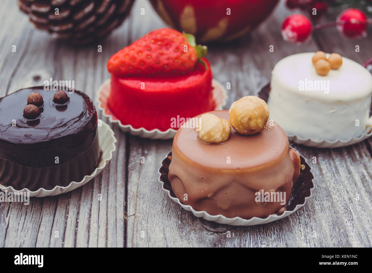 An array of Christmas desserts with colorful   , on wooden board Stock Photo